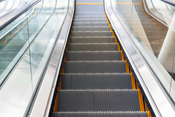 istock Empty escalator stairs in a mall or subway 1213333094