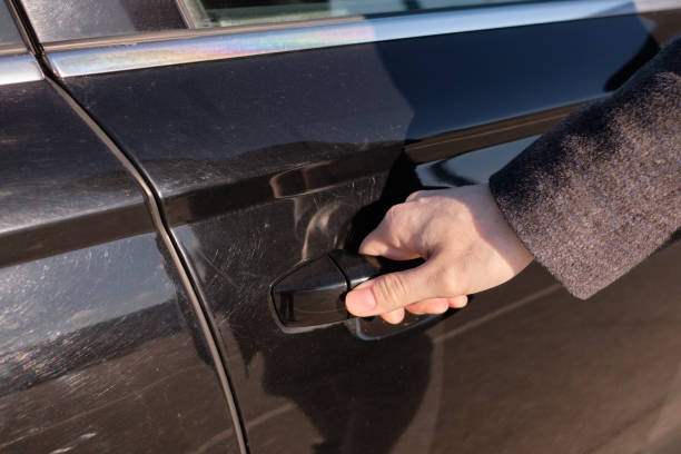istock The man closed the car door while going out. 1213333209