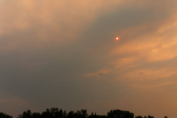 istock Smoke covering the sun during the Wildfires in Canada 1213335127