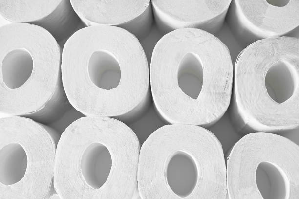 istock Toilet paper on a white background, essential goods.Texture 1213339184