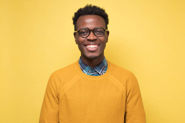 istock Young handsome african business man in glasses 1213340165