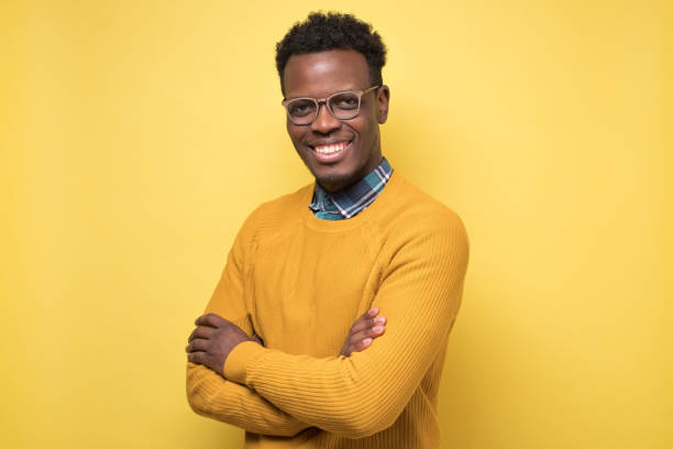 istock Young handsome african business man in glasses 1213340186