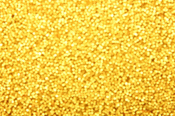 istock Abstract background of golden bokeh lights 1213349600