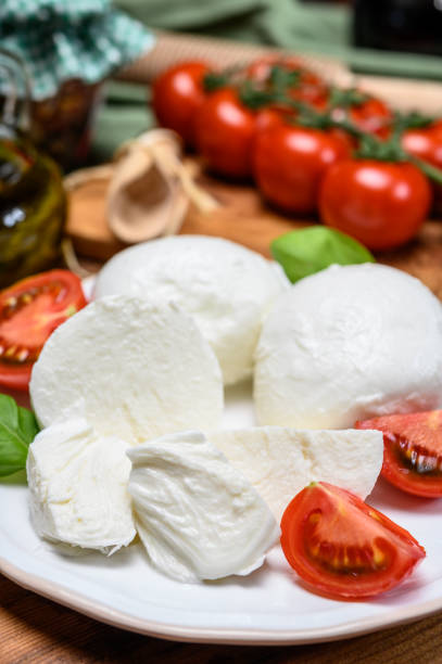 istock Cheese collection, white italian mozzarella cheese balls for salad or for appetizer snacks from deli shop in New York, USA 1213351766