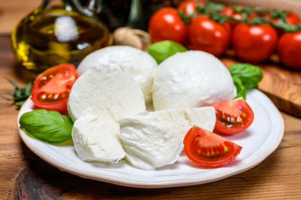istock Cheese collection, white italian mozzarella cheese balls for salad or for appetizer snacks from deli shop in New York, USA 1213351769