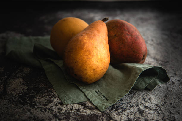 Group of pears in dark background