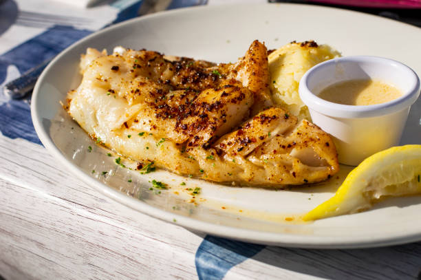 istock Delicious Cod Fillet with Seasonings on Top 1213367675