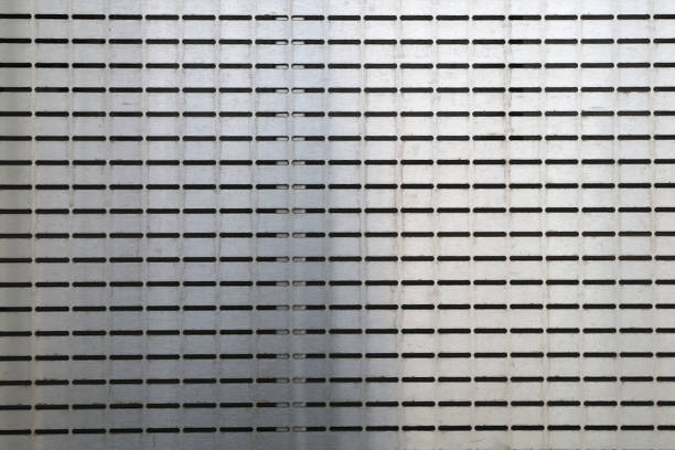 istock perforated metal background stainless steel aluminum texture 1213372926