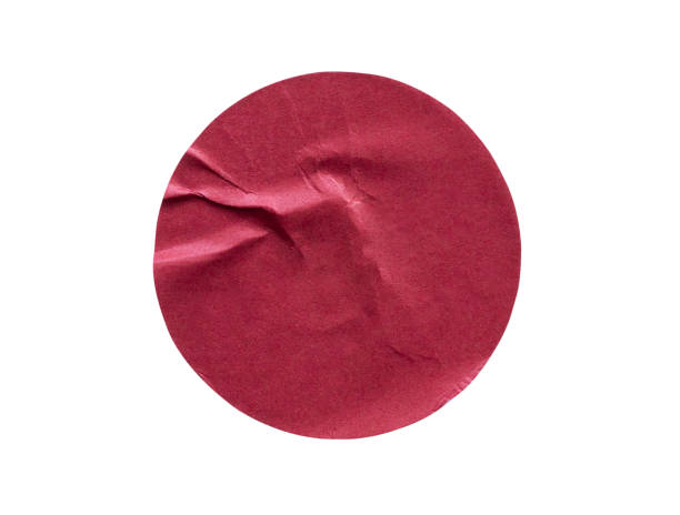 istock Blank red round adhesive paper sticker label isolated on white background 1213375000