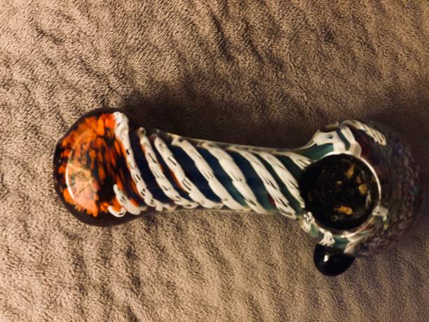 istock The whimsical glass pipe 1213375710