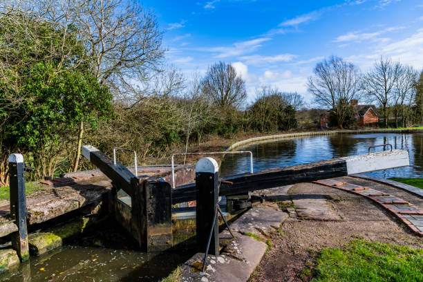 istock canal towpath green lush river scenery and landscape 1213377834