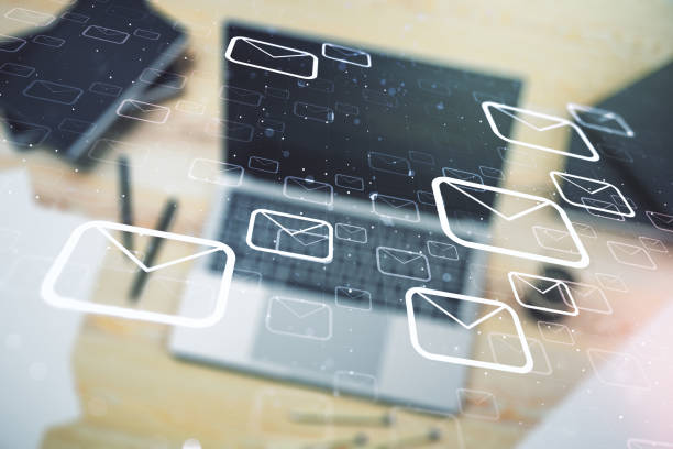 istock Creative concept of postal envelopes illustration on modern laptop background. Email and communications concept. Multiexposure 1213377850
