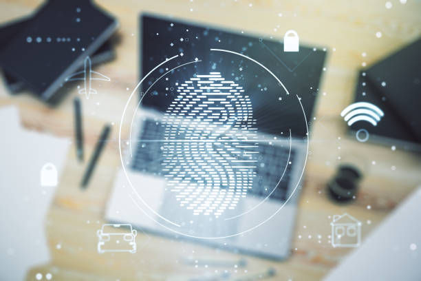 istock Multi exposure of creative fingerprint hologram on laptop background, personal biometric data concept 1213377885
