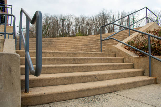 istock Steps in a Shopping Center With Green Railings 1213378071