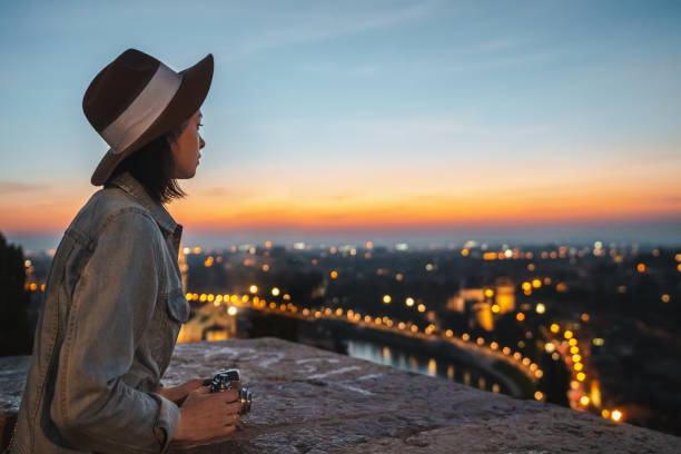 istock Young tourist looking at night view 1213398286