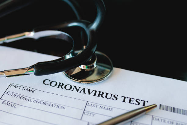 istock Medical form Coronavirus test on hospital table 1213398296