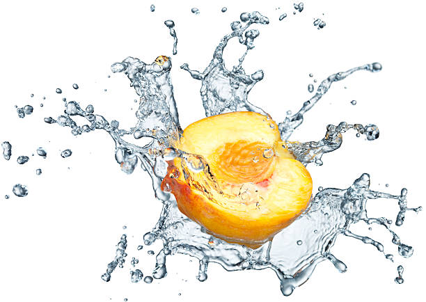istock Peach in spray of water. 121339972