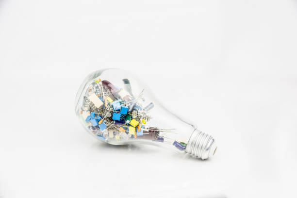 istock Abstract Background of electronic technology with an new inovation idea, electronics component put in the bulb. 1213401149
