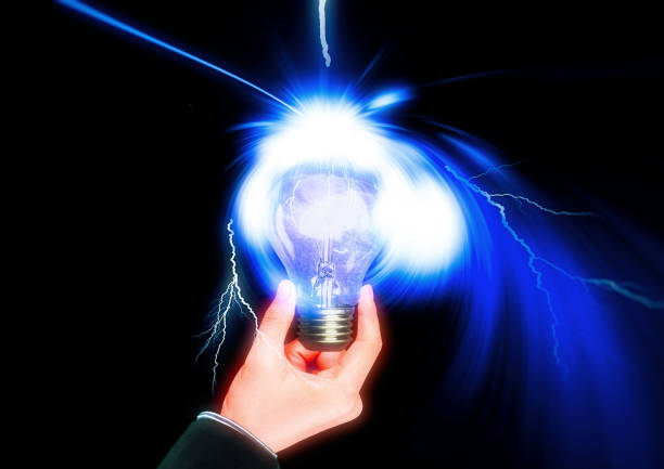 istock A glowing light bulb that illuminates the dark 1213401899