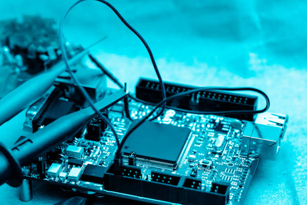 istock abstract background of engineering electronic circuit bord, closed up, engineering and technical experimental kit concept. 1213402949