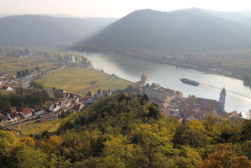 Wachau valley along Danube River, Austria\nThe Wachau flanks the Danube for about 20 miles.  The region’s mild climate and its favorable soils ensure that Wachau wines are both highly distinctive and of outstanding quality.