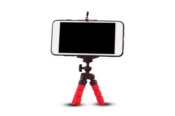 istock Cellphone on tripod  white background,Mobile smart phone  technology for live streaming blogger 1213406569