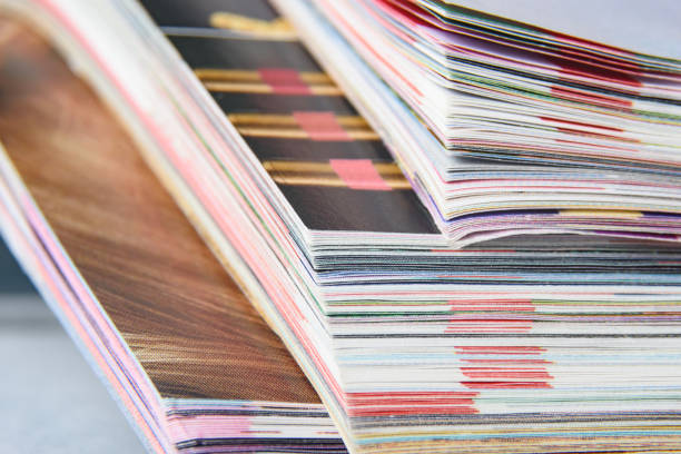 istock Abstract background image of stacked magazines. Selective focus 1213406734
