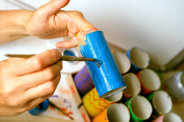 istock hands color toilet paper rollers for children's creativity 1213410232