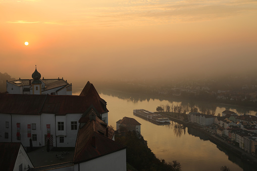 Sunrise in Passau Germany\nPassau is a town in Lower Bavaria, Germany, also known as the Dreiflüssestadt (\