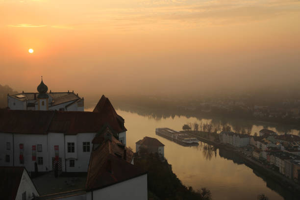 Sunrise in Passau Germany Sunrise in Passau Germany
Passau is a town in Lower Bavaria, Germany, also known as the Dreiflüssestadt ("City of Three Rivers") because the Danube is joined there by the Inn River from the south and the Ilz River from the north. inn river stock pictures, royalty-free photos & images