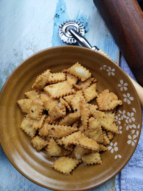 istock Namakpara (Khurma, Nimki, Mathri) which are  crispy, crunchy and savory strips in a bowl. 1213420898