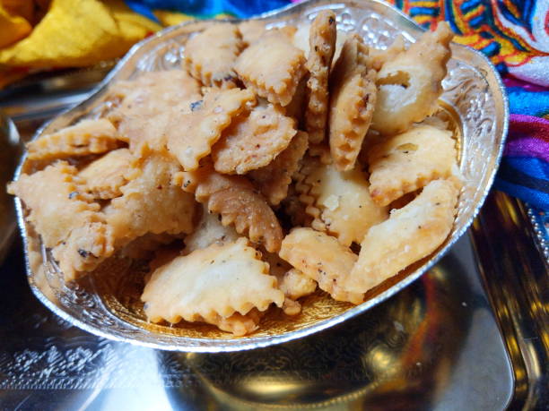 istock Namakpara (Khurma, Nimki, Mathri) which are  crispy, crunchy and savory strips in a bowl. 1213421045