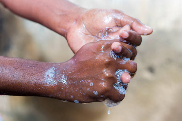 istock a man washing his hands by soap to maintain hygiene.stay healthy.avoid germ and virus. 1213421735