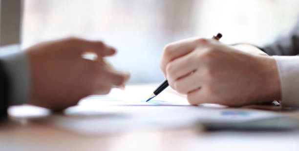 istock close up.employees discuss financial data. photo with copy space 1213424416