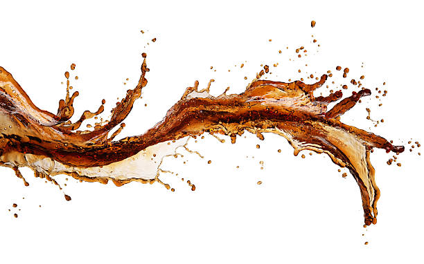 Isolated image of cola splash across a white background Cola splash isolated on white cola photos stock pictures, royalty-free photos & images