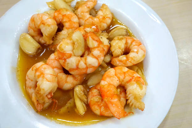 istock shrimp with butter sauce 1213424820