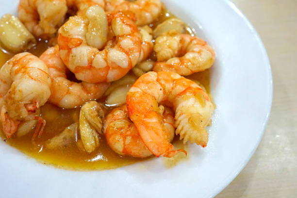 istock shrimp with butter sauce 1213424829