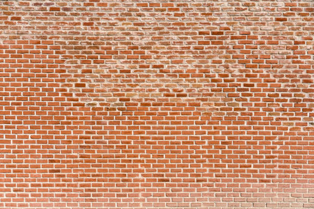 istock Old brick wall, old texture of red stone blocks closeup 1213425934