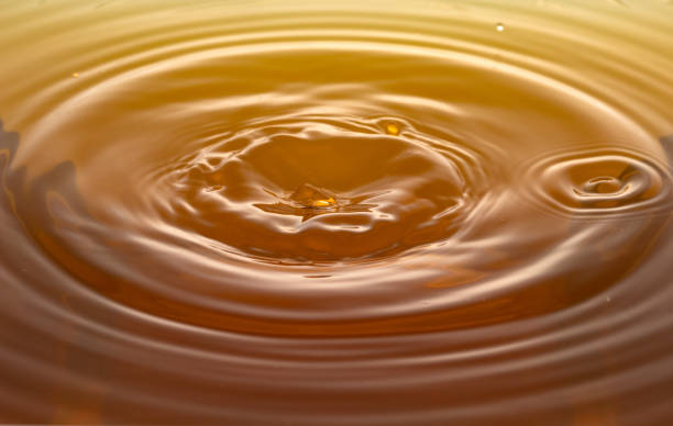 istock rippling after a few drops of Whiskey. 1213427987