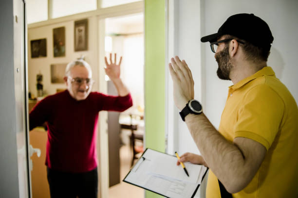 istock The postman brings the post to an older man 1213432752