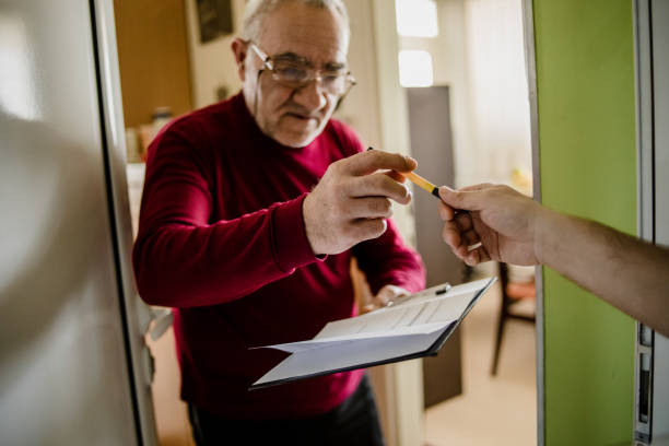 istock The postman brings the post to an older man 1213432859