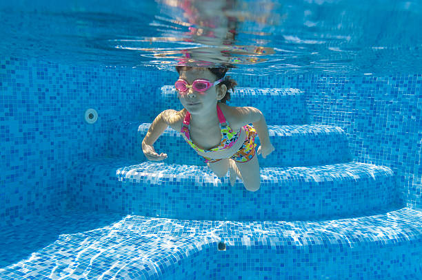istock Underwater kid in swimming pool 121343299