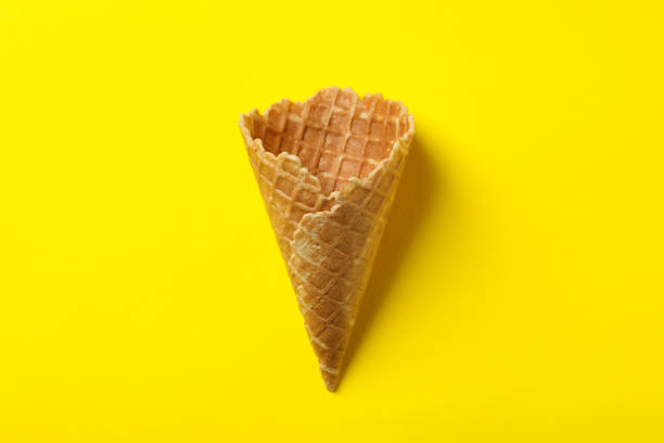 istock Waffle for ice cream on yellow background, space for text 1213433014