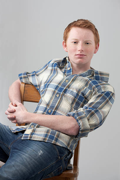istock Relaxed young red headed teen 121343605
