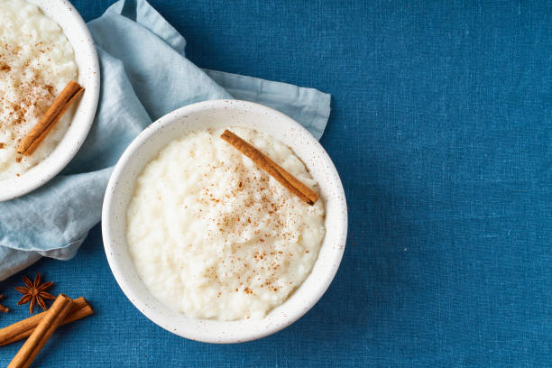 istock Rice pudding. French milk rice dessert. Dark background. Top view, copy space 1213436059
