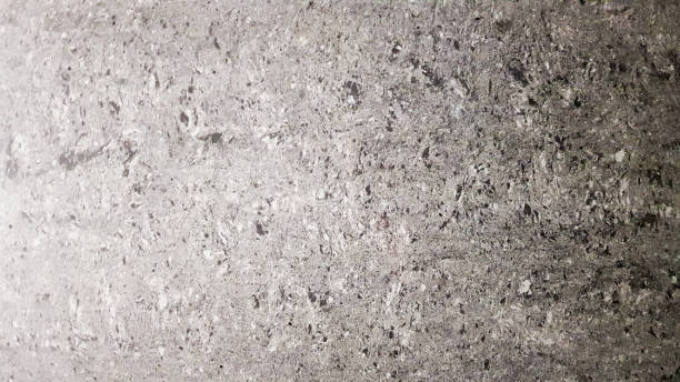 istock Texture and seamless background of gray granite. Background pattern, natural dusty dark gray slate texture with copy space for text decoration 1213436591