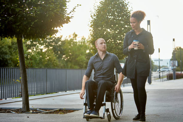 istock Businesspeople in Their 20s Wheeling and Walking to Work 1213437384