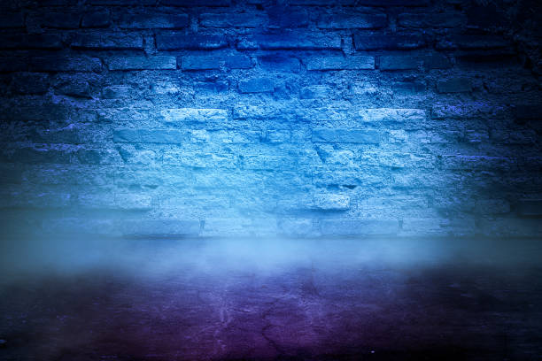 istock Texture dark concentrate floor with brick wall. spotlight color with mist or fog 1213440581