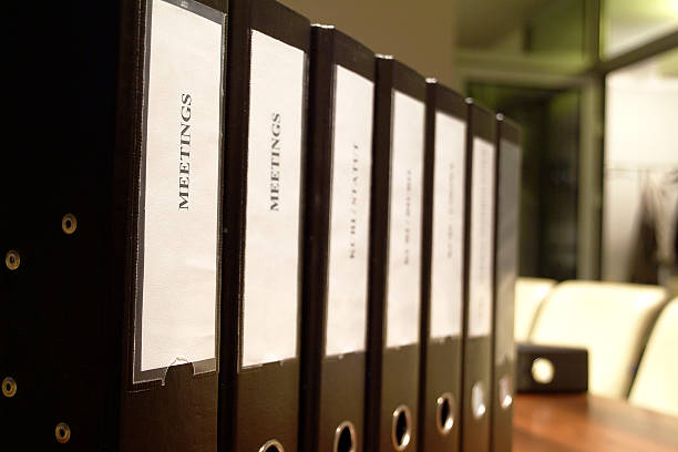 istock Close-up of ring binders standing in row on the table 121344881