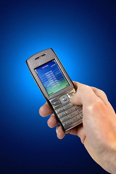 istock Man holding in hand mobile phone with message I love 121345000